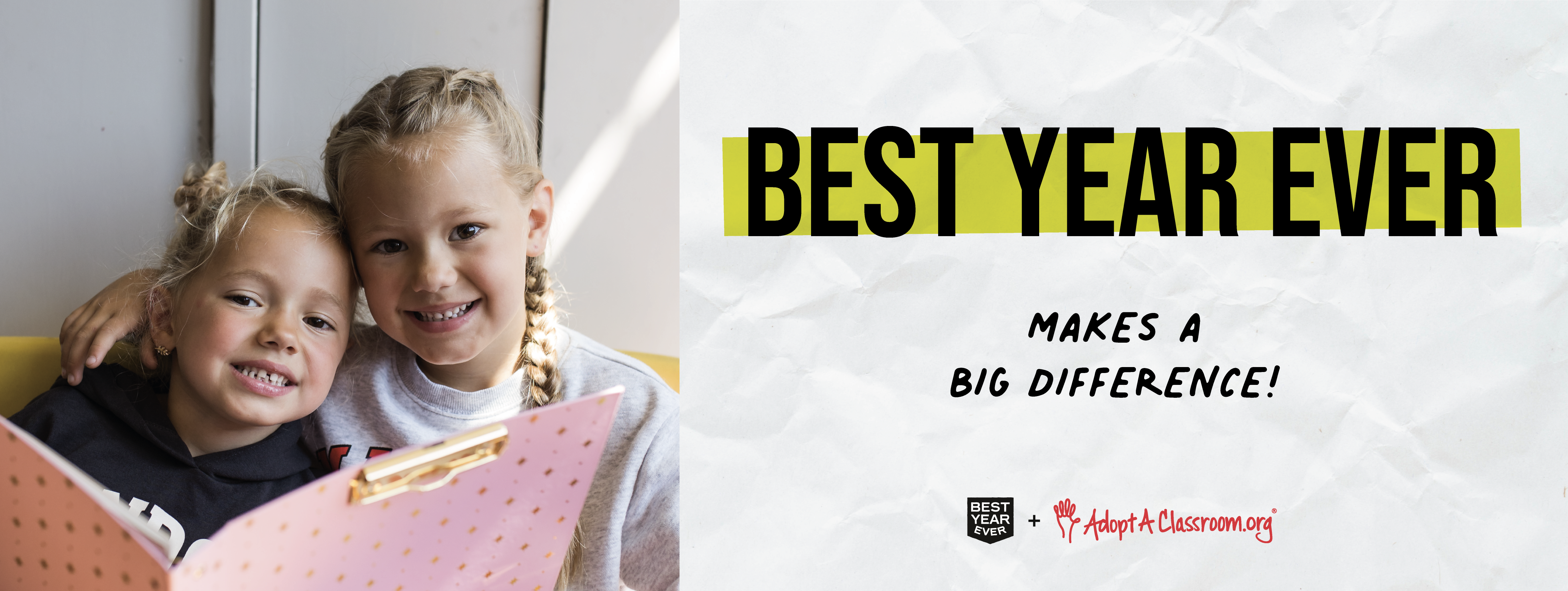 "Best Year Ever Makes a Difference. Two young girls holding a pink folder."